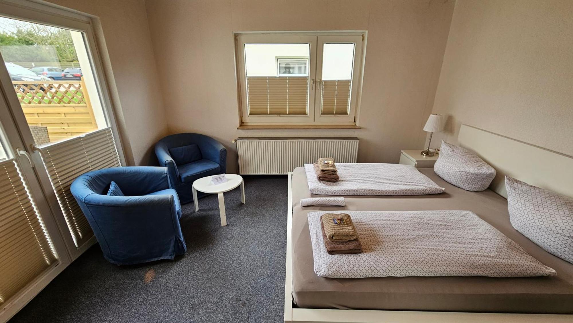 Hotel Dorfkrug Buesum - Guenstige Altbauzimmer Am Oland Pokoj fotografie